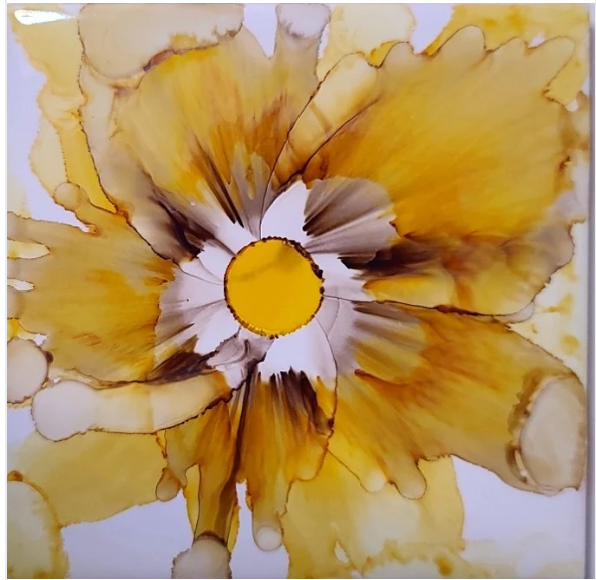 Alcohol ink tile art featuring a golden yellow flower with flowing, translucent petals and a white daisy center with a golden core, on a light background.